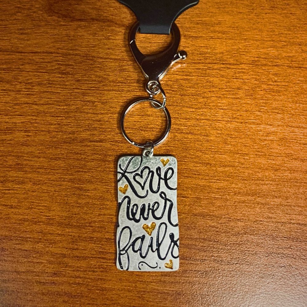 Love Never Fails Silver Keychain